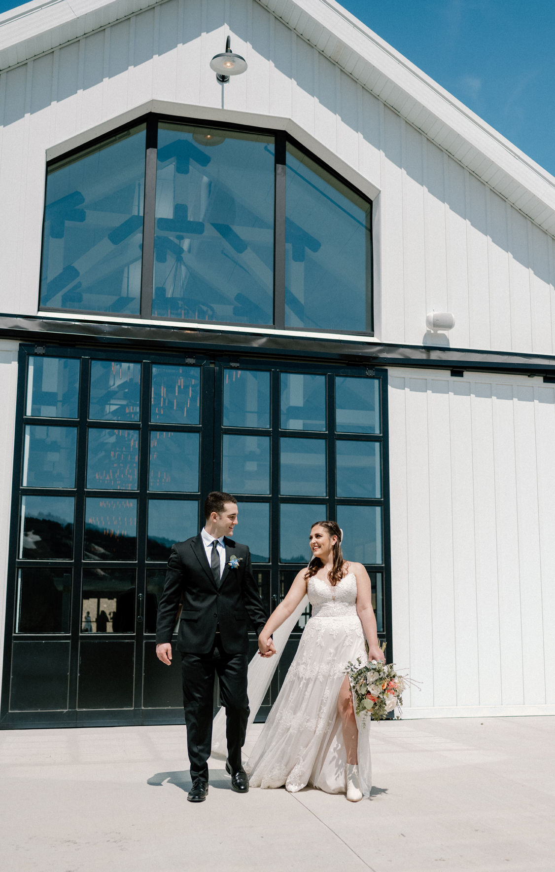 Happy couple exiting the building